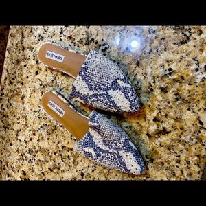 Steve Madden flat mules.